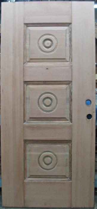 Door With Circles In Three Center Panels After Stripping