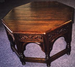 Octagonal End Table With Dark Striped Wood Grain On Top