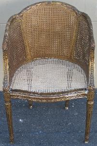 GoldColoredBarrelChairWithHandWovenCaneSeatCompleted